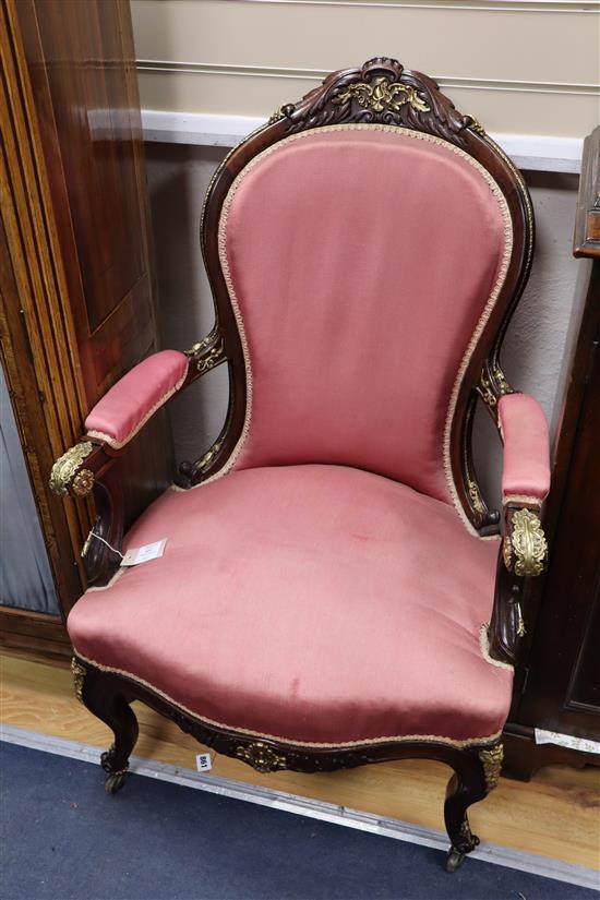 A pair of 19th century French brass mounted rosewood fauteuil, 63cm